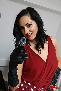 Bonnie Bellotti at Lethal Lipstick | Bonnie Bellotti in the office puts on a pair of black leather gloves