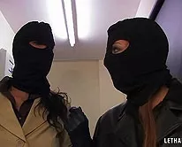 Masked Bitches at Lethal Lipstick | Cate Harrington and Tammy Lee are Masked Bitches in this gun girl movie as they sneak up on Office Girl Annabelle, subdue her and attempt to get the code to the safe!