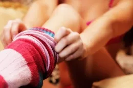 Darelle O at More Than Nylons | Darelle is pretty edible at the best of times, so put her in a pair of candy striped socks and you\'ve got a perfect recipe for some lickable lusciousness. Tanned skin, a cheeky smile and a sofa crawl that will make you weep. Not just for those with a sweet tooth.