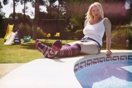 Lyla Ashby at More Than Nylons | A saucy pair of socks is never a bad look in my opinion. Particularly when they're worn by a curvy young lady like Lyla. Dipping her sock clad toes in and out of the water got us rather flustered. Though it wasn't long before Lyla showed us a couple of other things that were 'slippery when wet'!