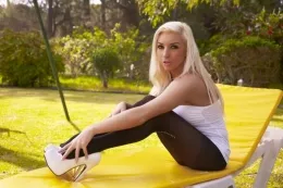 Alex Adams at More Than Nylons | Black sheer tights on a beautiful blonde with sun kissed skin. Jus the tonic for this time of year wouldn't you say? So we've got Alex reader to lounge, pose and tease just for your pleasure. She's quite a sexy little creature I have to say. And she'll certainly warm up anyone who sees this rather naughty and very tasty tease.