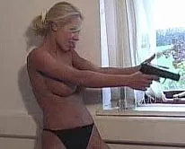 Shoot Out at Lethal Lipstick | Just back from a bank heist, Petra enjoys looking and felling the loot. Whilst she relaxes back and smiles at the thought what she's just done...she hears sirens....