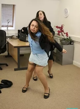 Office Problems at Femme Fight | Sophia Smith's lame attempt to get a promotion had failed once again and now her Human Resources manager, Alicia, took great pleasure it telling Sophia she had been unsuccessful. perhaps this would bring Sophia down a peg or two, after all, her refusal to show Mr Fawcett the lace hem of her slip was the last straw!