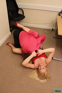 Office at Femme Fight | Office temp Frankie Babe is tired with sexy Saphire taking liberties with her and as Saphire sits on Frankie's desk, Frankie asks her to politely move..she refuses..only one thing for it