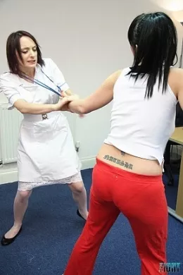 Impatient Patient at Femme Fight | Lexi Ward is certain she's been admitted to the asylum in error and challenges the duty nurse, Paige Fox about her situation. Paige tries to calm the situation down but there is just no calming Lexi down!