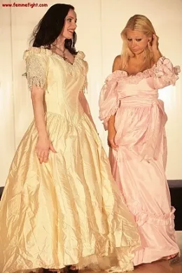 The Bride And The Bitch!! at Femme Fight | Bride to be, Morrigan, is admiring herself all dressed up in her ivory wedding dress when bitch Corinne enters. Corinne is pissed that someone has ruined her own dress and she is almost certain it is Morrigan. If Corinne's day is ruined, she'll make sure she ruins Morrigans. She lunges for Morrigan determined to rip the wedding dress right off her!