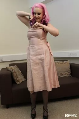 Lilli R at Ripping 4 Fun | Lilli R looks delightful in her pink satin dress but she has a more mischievous, daring side to her that will see her completely trash the outfit, pulling it apart and loving the sound of the fabric tearing and splitting apart