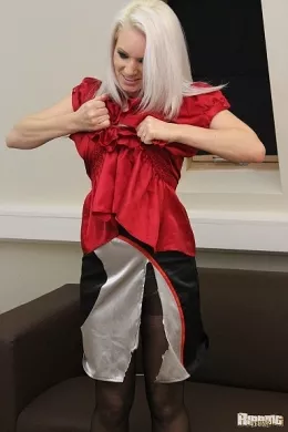 Emma Clarie at Ripping 4 Fun | The one and only Emma Clair goes to town on ripping, tearing and shredding her gorgeous red satin blouse and satin skirt. Go for it Emma!