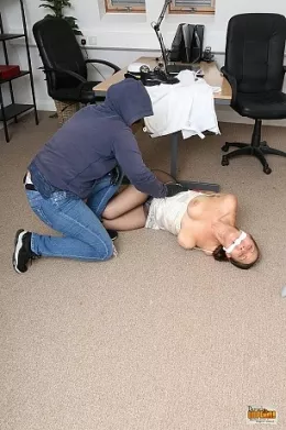 Shauna at Damsels in Peril | The bandit returns and this time has broken into the office of Navy Officer Shauna. As she is rifling through the draws in search of a top secret file, an unsuspecting Shauna returns and in an instant her world is turned upside down