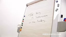 Charliee Rose at Damsels in Peril | Poor Charlie Rose finds herself stripped, bound and gagged in her office. How she ended up like this she just doesn't know but there is a message for her on the flip chart telling her 'The key is somewhere in this building..' so Charliee starts searching in vain