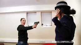 Tammie Lee at Damsels in Peril | The burglar is surprised by the appearance of the Female police officer and she has no intention of being arrested, in fact unwittingly, the WPC may have just given her a sure fire ticket out of the place