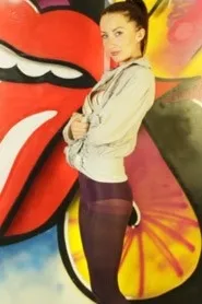 Sophia Smith at Sophia's Sexy Legwear | Did you notice the graffiti wall behind me? What do you think? You need to focus on what is important! Why are you looking at the wall art when I am here in these purple tights and beautiful underwear? Pay attention! You know how I like all eyes on me......