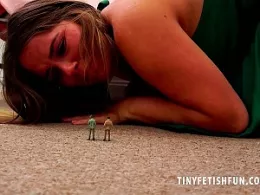 Siobhan Graves at Tiny Fetish Fun | The tinies had made it into Siobhan Graves lounge and they were eager to see what this beautiful Giantess was wearing beneath that dress of hers...but Siobhan spots them and in a moment, they are helpless, shaking and trembling at the soles of her feet and her very high, sharp, high heels