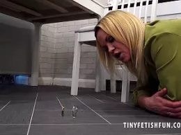 Frankie Babe at Tiny Fetish Fun | Busty blonde giantess Frankie Babe plays around with her most recent find of inch high helpless, pathetic, little guys. Theres nothing like feeling the crunch of their tiny bones and the squelch of their tiny body beneath her bare feet or feeling them squirming inside her mouth