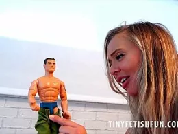 Beth Bennett at Tiny Fetish Fun | Buxom giantess Beth Bennett has found a tiny guy in her kitchen and even though he looks like a muscle man, Beth teases him with his..well...size issues. She scoops him up and holds him tightly in her hand threatening him with a view of her mouth before inspecting his manhood