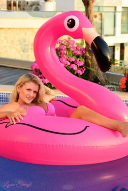 Lycia Sharyl at Lycia Sharyl | Floating around before sunset in the infinity pool on my gorgeous pink flamingo I made this set of images in gorgeous soft natural light. It was so relaxing here. I was so chilled. Just after these pictures were done, I had a shower, got smartened up and walked into town for some really yummy cocktails and a lush dinner. The waiters always serve the girls with the biggest boobs first! Ha! If you've got it, flaunt it as the phrase goes.