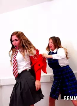 Siobhan Graves at Femme Fight | The two friends, Lacy May and Siobhan Graves are getting into a bit of a verbal confrontation. One of them has just bought a new magazine yet the other has immediately begun reading it. hardly fair!