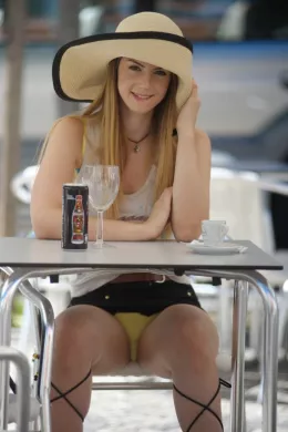 Stella Cox at Breath Takers | Stella treats herself to a new sun hat.Stella has a cooling drink in the local market, then invites us back to her bedroom to watch while she parades in the mirror and romps on her bed in her sexy yellow knickers - and little else!