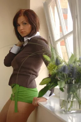 Iga at Girlfolio | The inimatable Iga gets environmentally friendly in little more than a skimpy pair of green shorts.