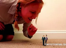 Satine Sparks at Tiny Fetish Fun | Giantess Satine Spark  is in charge as she towers over the collection of tiny guys, all standing up obediently at her feet shaking and quivering in fear of the giantess