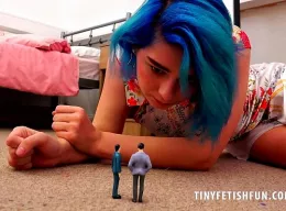 Baby Dolliy at Tiny Fetish Fun | Baby Dolliy was having such a good day and then she saw the group of tinies standing in the pile of her bedroom carpet looking up at her. Clearly they were trying to look up her skirt desperate for a glimpse of her knickers