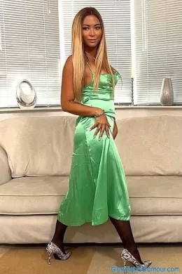 Natalia Forrest at Gloss Tights Glamour | Natalia steps forward in this behind-the-scenes BTS video footage wearing a stylish mint green dress (sans bra & briefs/panties), black glossy tights/pantyhose, and silver/grey patterned high heeled court shoes that stay on throughout this glorious tease that clearly shows she is having fun with you when she reveals her special 'personal accessory/toy' and doubles down on the tease factor!    4K Video download available