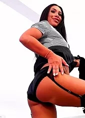 Hannah Shaw at Hot Panty Fun | Brunette Hannah Shaw looks ready for a day in the office as she wears a smart short sleeved black and white striped satin button up blouse and a long, blue, plated  length purple satin skirt. We wonder is she is wearing matching underwear beneath and we are about to find out